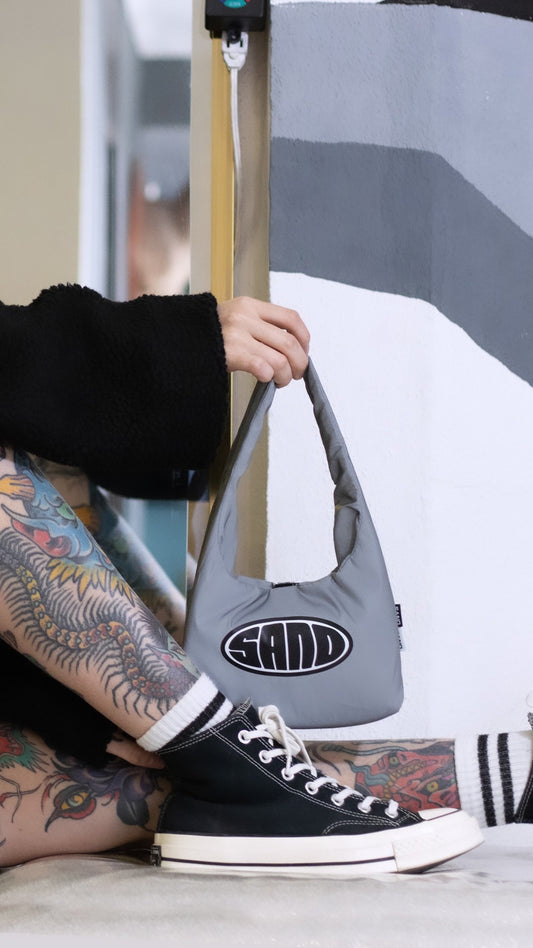 bolso de mano reflectante